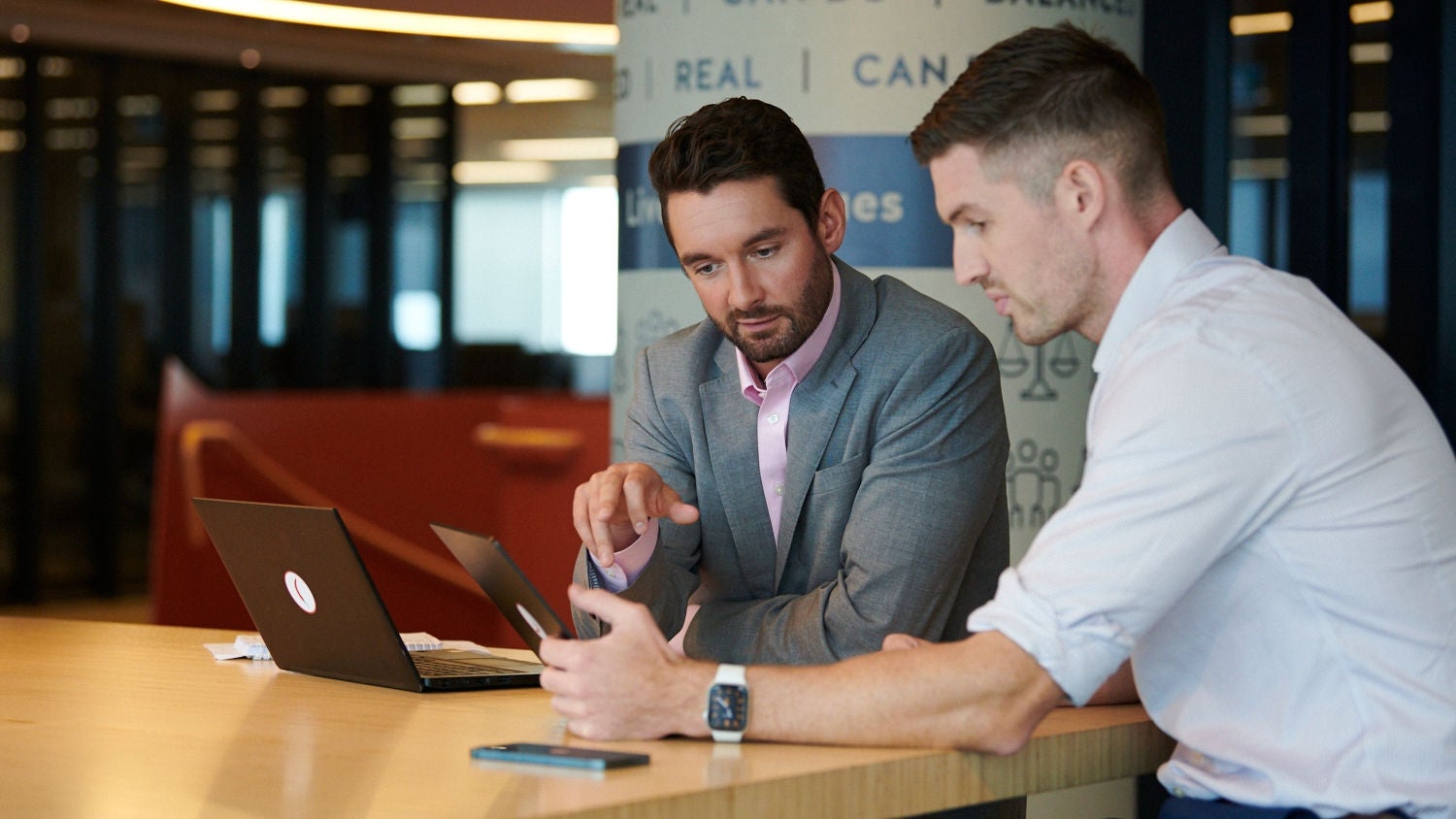 Two men learning about home loan jargon